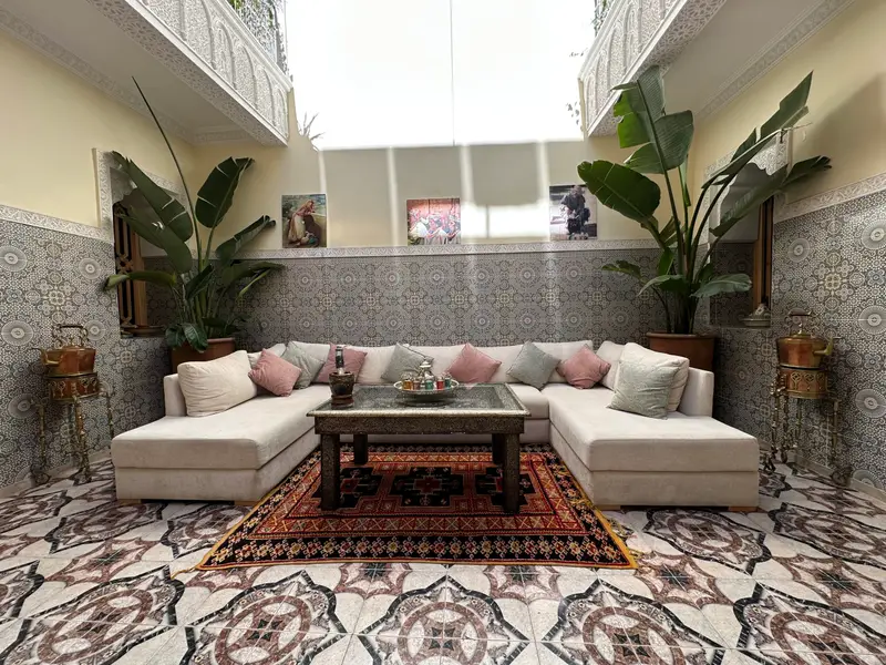 Majestic view of Riad FRIDI's main patio with traditional Moroccan architecture